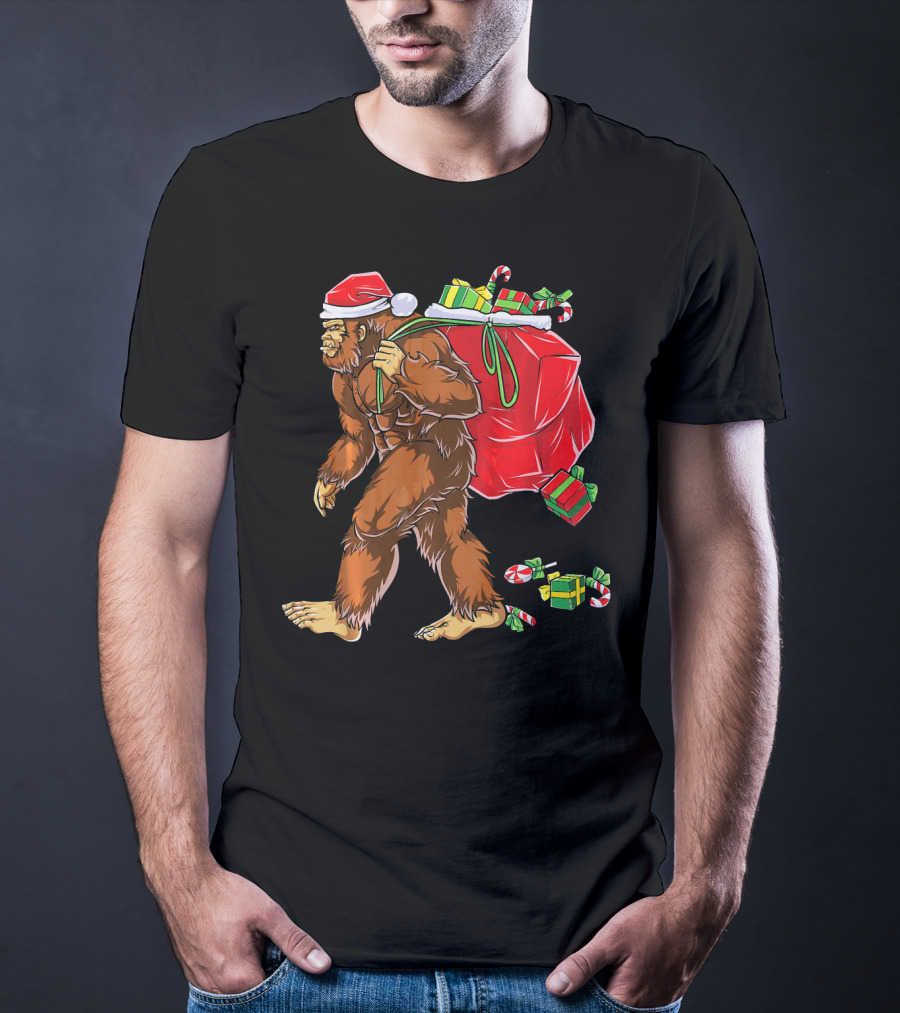Bigfoot Santa Carrying Gifts With Candy Canes T-Shirt