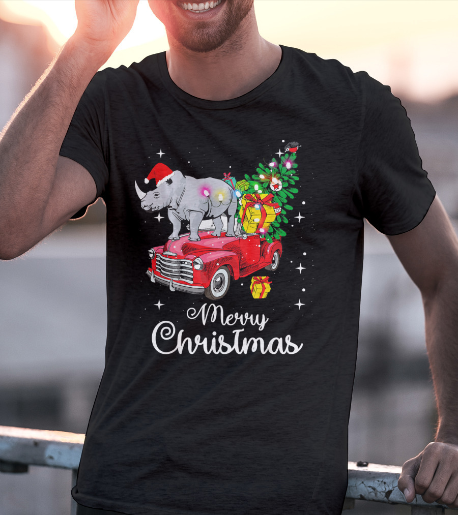 Merry Christmas Rhino Santa Hat On Red Truck With Christmas Tree And Gifts T-Shirt