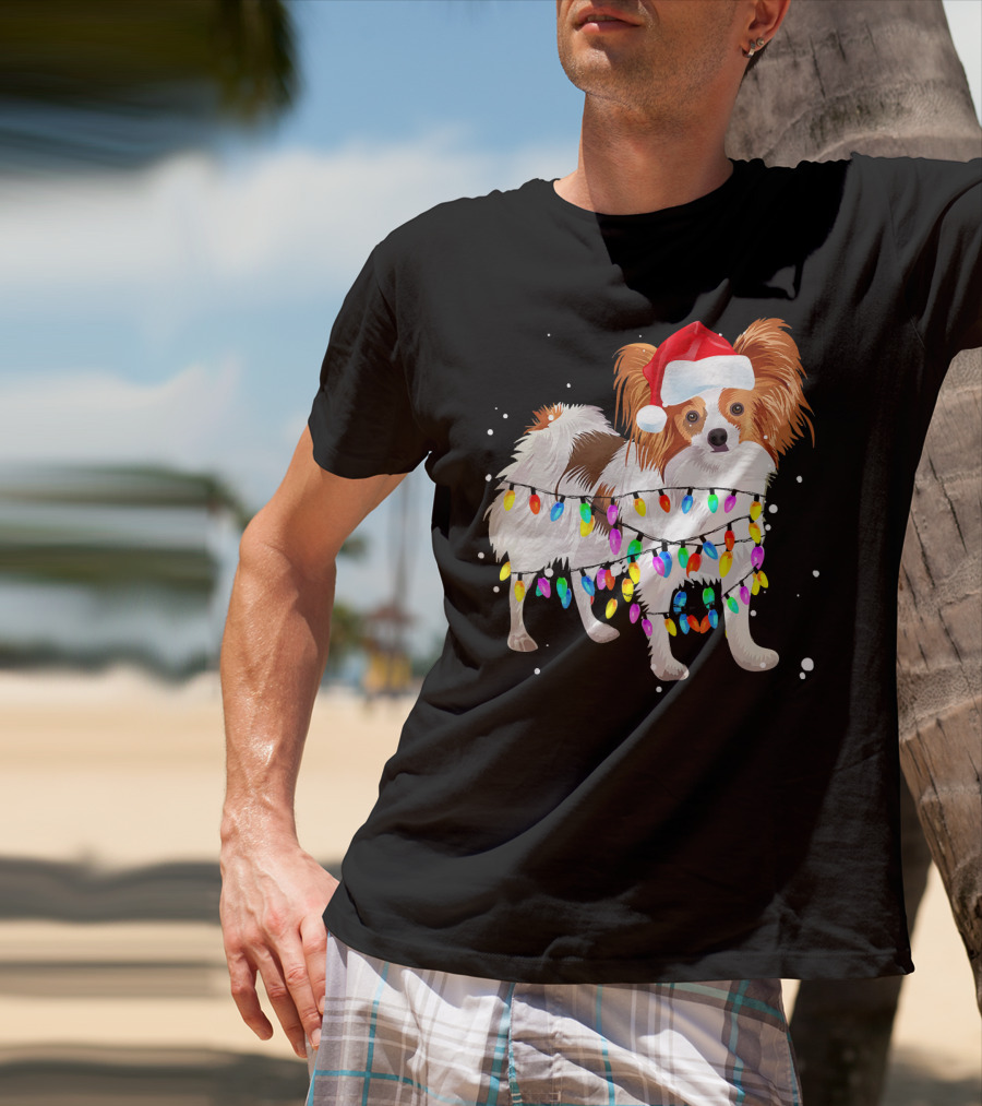 Papillon Dog Wrapped In Colorful Christmas Lights Wearing Santa Hat T-Shirt