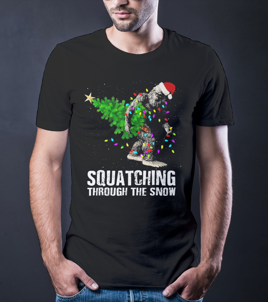 Squatching Through The Snow Bigfoot Christmas Lights Santa Hat T-Shirt