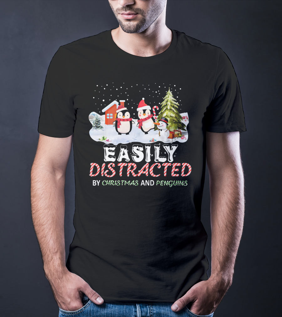 Easily Distracted By Christmas And Penguins In Winter Wonderland With Snowman House And Tree T-Shirt