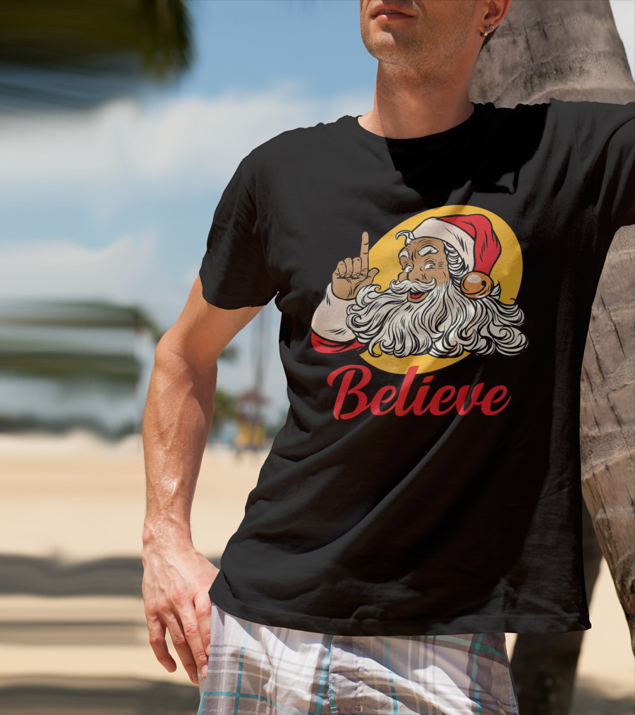 Black Santa Claus With Believe Caption And Yellow Background T-Shirt