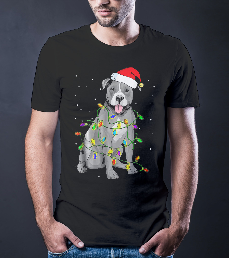 Pitbull In Santa Hat Wrapped In Christmas Lights With Snowy Background T-Shirt