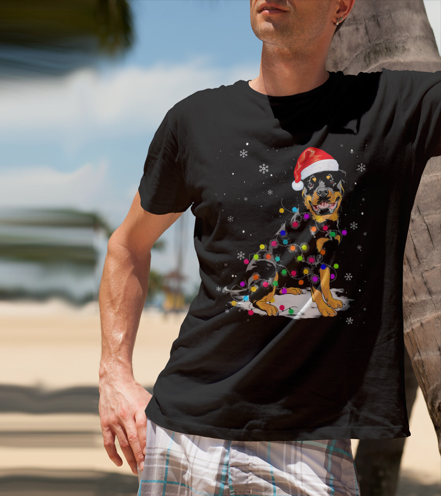 Rottweiler With Santa Hat And Colorful Christmas Lights In Snowy Scene T-Shirt