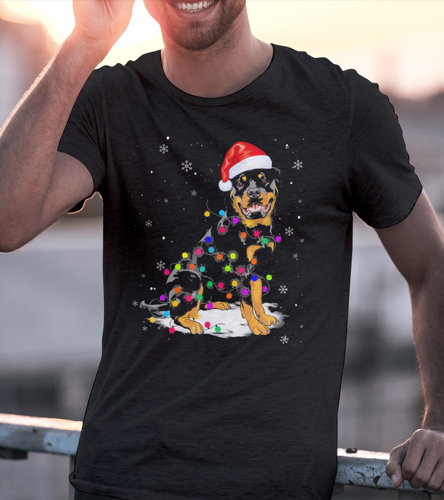 Rottweiler With Santa Hat And Colorful Christmas Lights In Snowy Scene T-Shirt