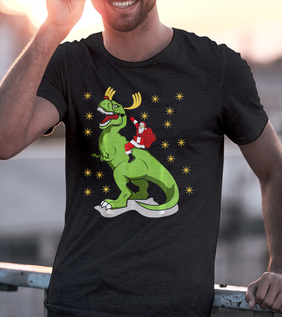 Santa Claus Riding Dinosaur With Reindeer Antlers And Stars T-Shirt