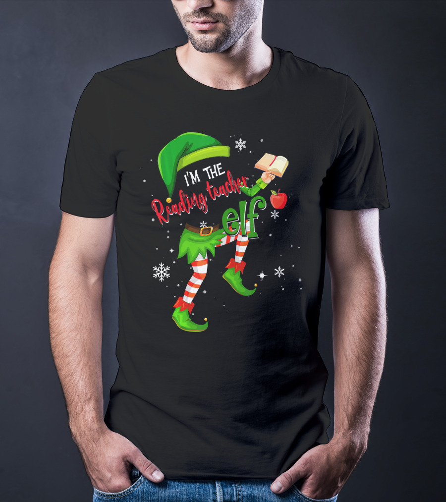 I'm The Reading Teacher Elf Holding Book Apple Wearing Elf Outfit Snowflakes T-Shirt