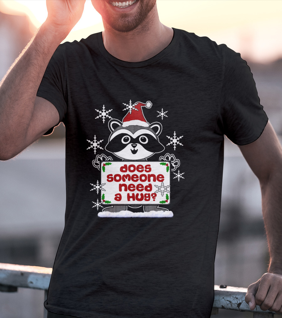 Does Someone Need A Hug Cute Ugly Christmas Raccoon With Santa Hat And Snowflakes T-Shirt
