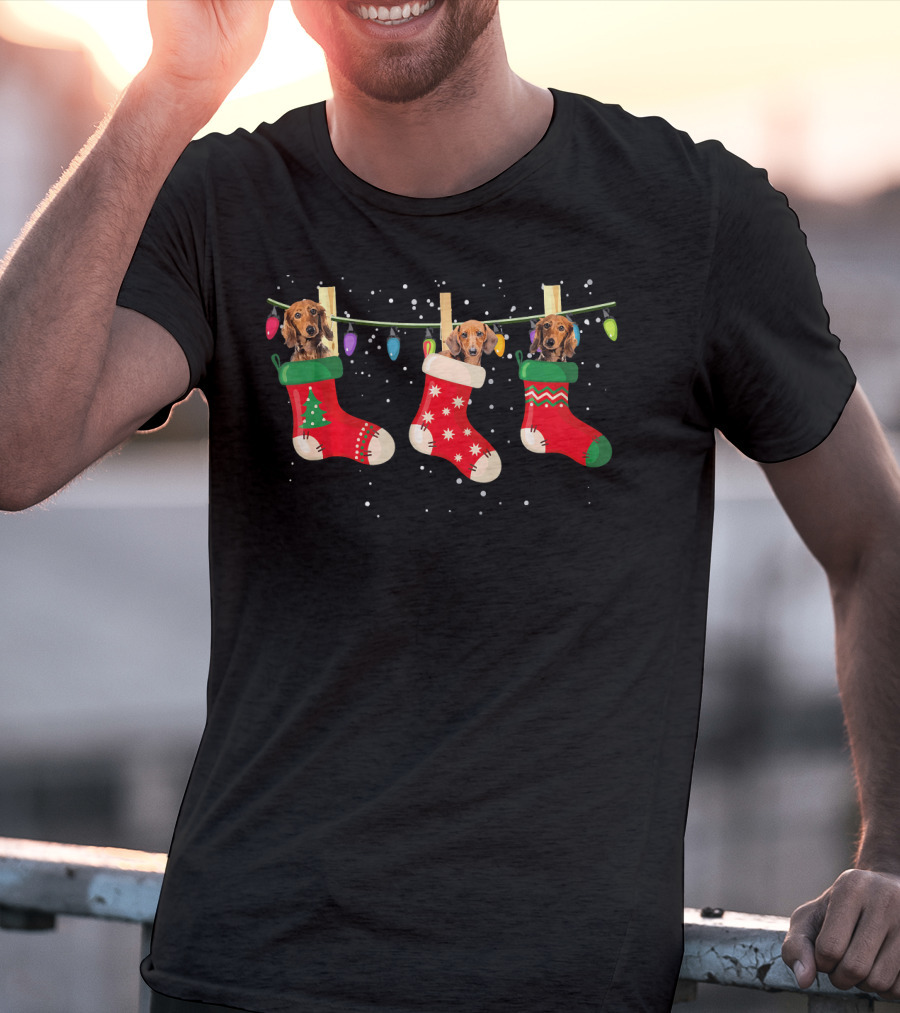 Dachshund Puppies In Christmas Stockings With Festive Lights Snowflakes T-Shirt