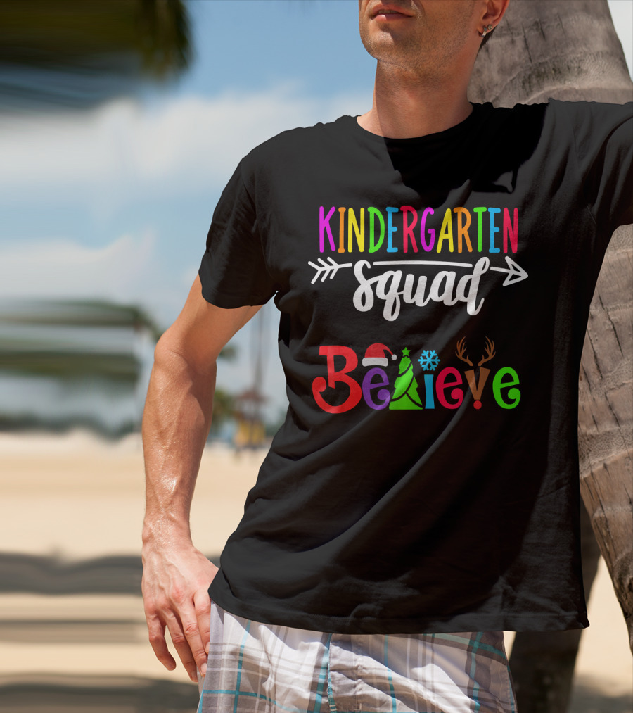 Kindergarten Squad Believe Christmas Text With Santa Hat Tree Snowflake And Reindeer Antlers T-Shirt