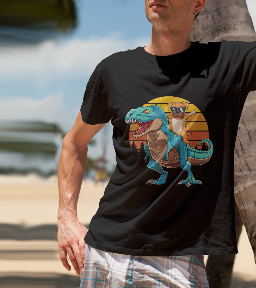 Boxer Dog With Sunglasses Riding Blue T-Rex Against Sunset Background T-Shirt
