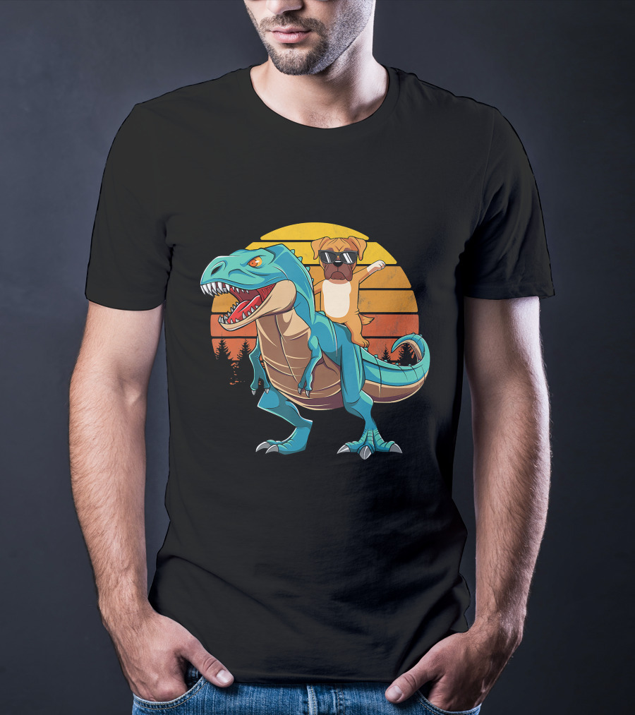 Boxer Dog With Sunglasses Riding Blue T-Rex Against Sunset Background T-Shirt